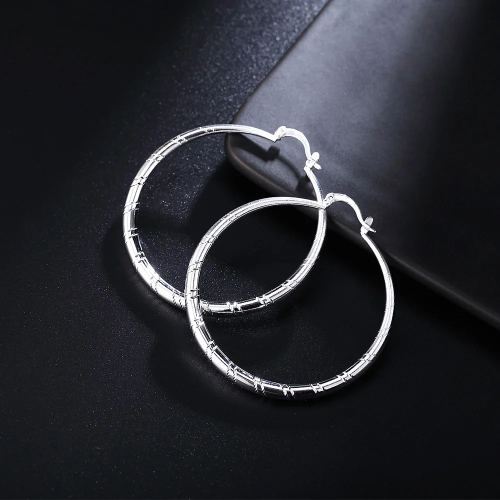 Statement Earrings Oversized - Grandes boucles d'oreilles circulaires en argent
